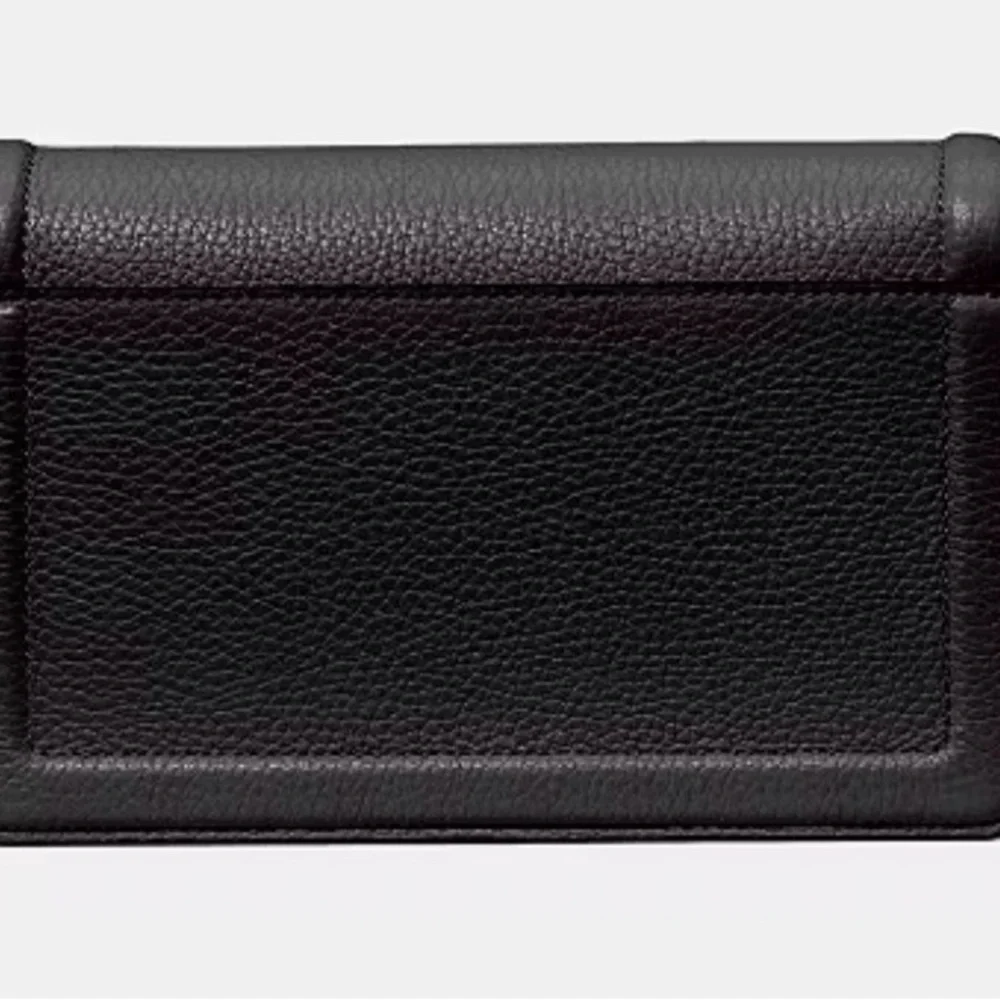 kate spade New York Knott Flap black pebbled leather crossbody with gold chain